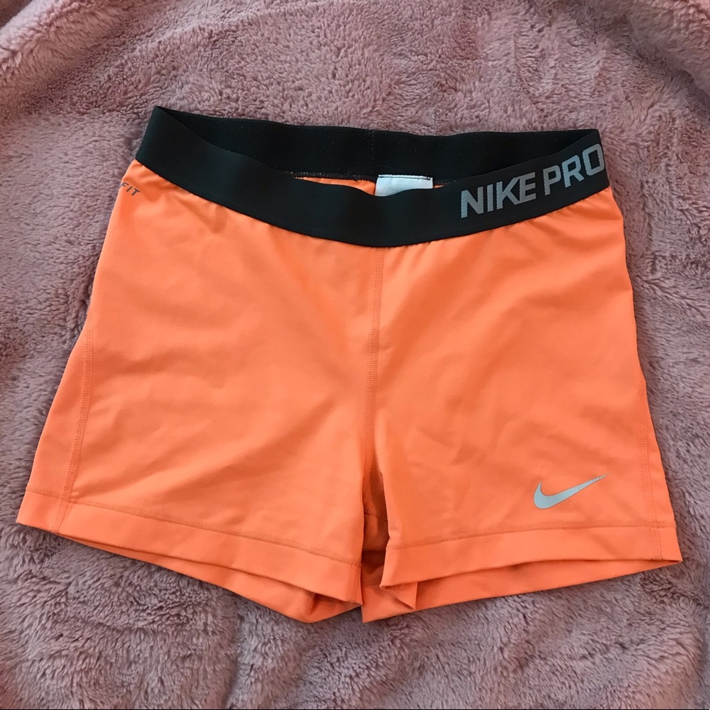 orange nike drifit spandex shorts